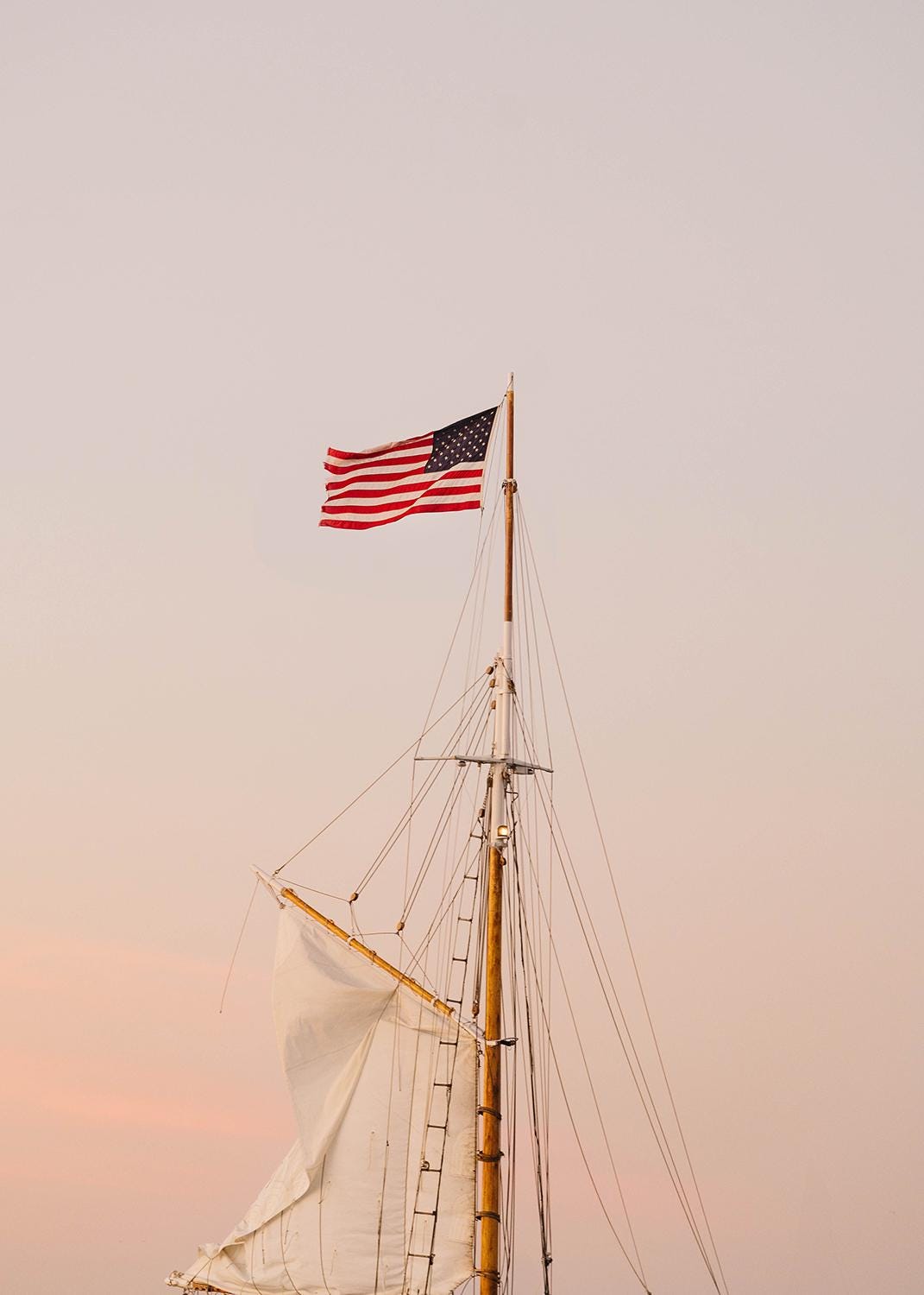 American Flag Sailboat Print – Nantucket Coastal Wall Art, Nautical Photography, Patriotic Ocean Decor, Summer Seascape Photo