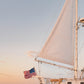 Nantucket Sailboat Print, Golden Hour Coastal Photography, Nautical Wall Art with American Flag, Chelsea Victoria Fine Art