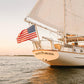 Sailboat Wall Art Print – Coastal Nautical Decor with American Flag at Sunset, Cape Cod Sailing Photography, Beach House Wall Art
